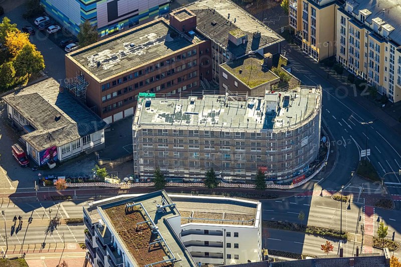 Aerial photo, construction site new apartment building for student living at the intersection Neue Bahnhofstraße and Friedrichstraße next to the health department, Mitte, Hamm, Ruhr region, North Rhine-Westphalia, Germany, apartment building, architecture, view, construction project, construction site activity, construction site vehicles, DE, drone photography, development, Europe, Friedrichstraße, building, health department, infrastructure, construction, cranes, aerial photography, photography, aerial photography, new building, Neue Bahnhofstraße, perspective, summer, city, urban development, urban landscape, road intersection, daylight, overview, urban, traffic routes, bird's eye view, residential building, birds-eyes view, modern architecture, overview, student housing