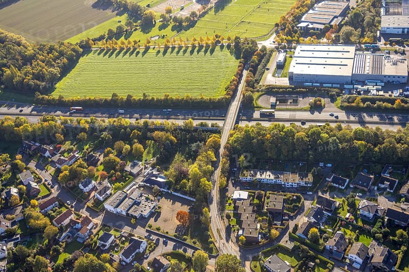 Aerial view, Wambelner Straße bridge over the A2 motorway, meadow area surrounded by autumn trees on the A2 motorway, autumn trees, Rhynern district, Hamm, Ruhr area, North Rhine-Westphalia, Germany, motorway, bridge, DE, Europe, aerial photography, aerial photography, road traffic, overview, birds-eyes view, overview