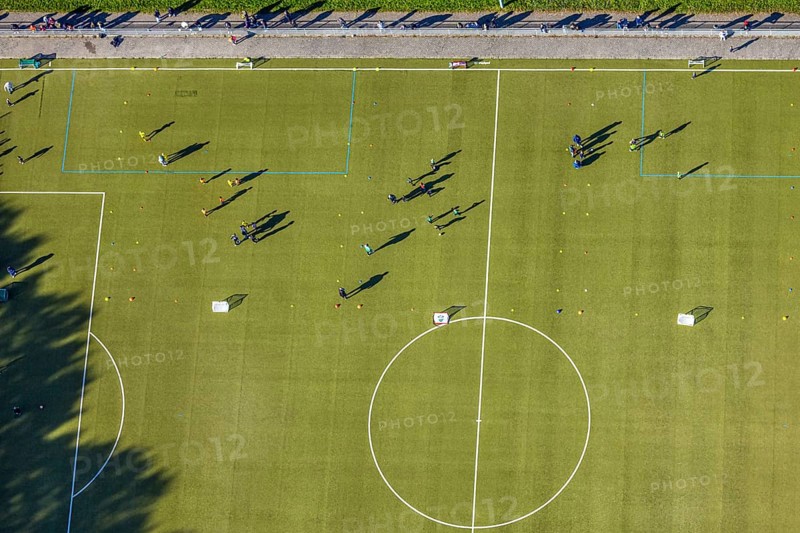 Aerial view, soccer stadium sports ground TuS 1910 Wiesergofen, young people training, vertical photo and shadow casting, Pelcum district, Hamm, Ruhr area, North Rhine-Westphalia, Germany, DE, Europe, soccer field, soccer stadium, aerial photography, aerial photography, sports complex, sports field, overview, birds-eyes view, overview