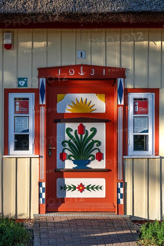 Decorative front door from 1931 on a residential building, Ahrtenshoop, Darß, Mecklenburg-Western Pomerania, Germany