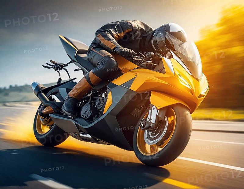 A motorcyclist racing on a yellow bike at high speed during sunset, AI generated