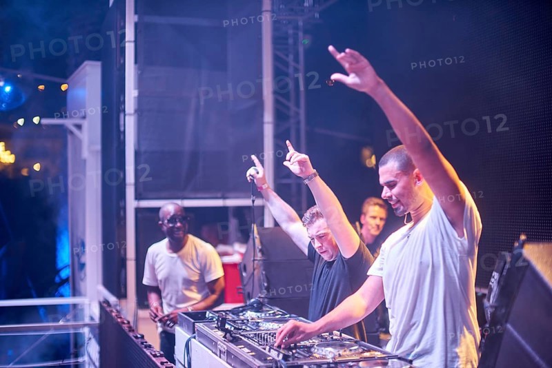 EDITORIAL and NEWS ONLY, rare moment of joint DJ back to back performance of edm dance music DJ Afrojack performing with DJ Hardwell on DJ pult at Starbeach events festival Hersonissos, Crete, Greece, on 17. July 2017