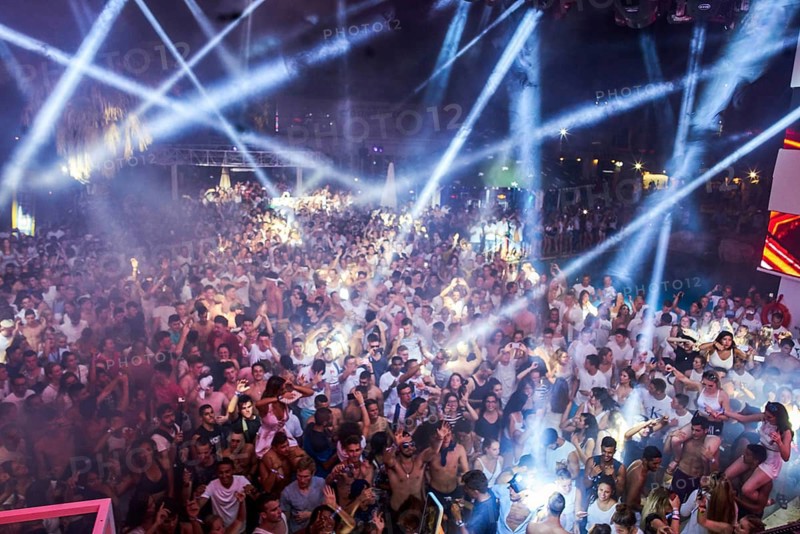 EDITORIAL and NEWS ONLY, crowd cheering towards rare moment of joint DJ back to back performance of edm dance music DJ Afrojack performing with DJ Hardwell on DJ pult at Starbeach events festival Hersonissos, Crete, Greece, on 17. July 2017