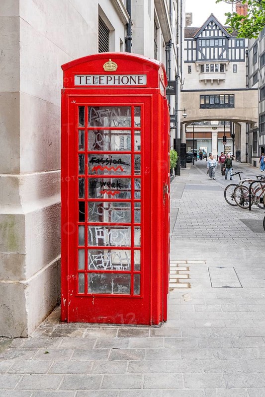 London, United Kingdom - 15 May 2025: Classic british symbol: a weathered red telephone box