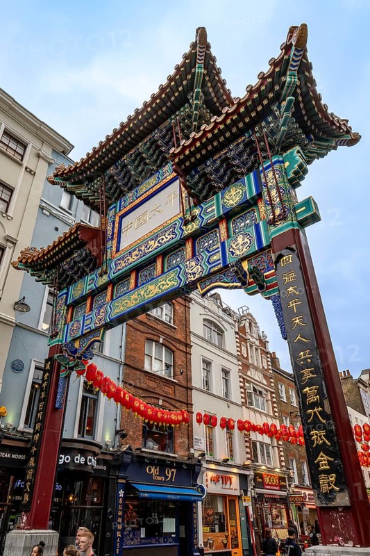 London, United Kingdom - 15 May 2025: Ornate and colorful traditional chinese gate marking the entrance to London's chinatown