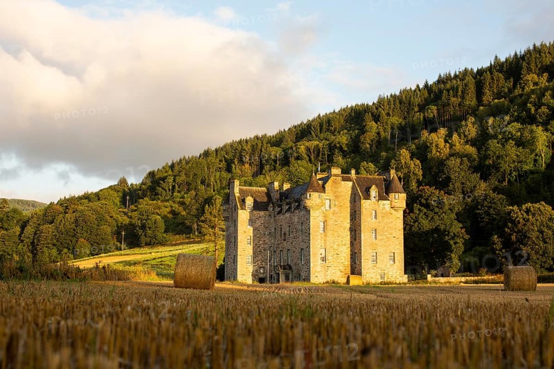 Castle Menzies and hay bales, Weem, Aberfeldy, Perthshire, Scotland, UK