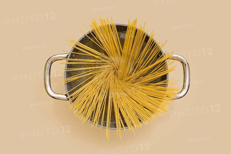 Top view of a pan of spaghetti pasta in boiling water