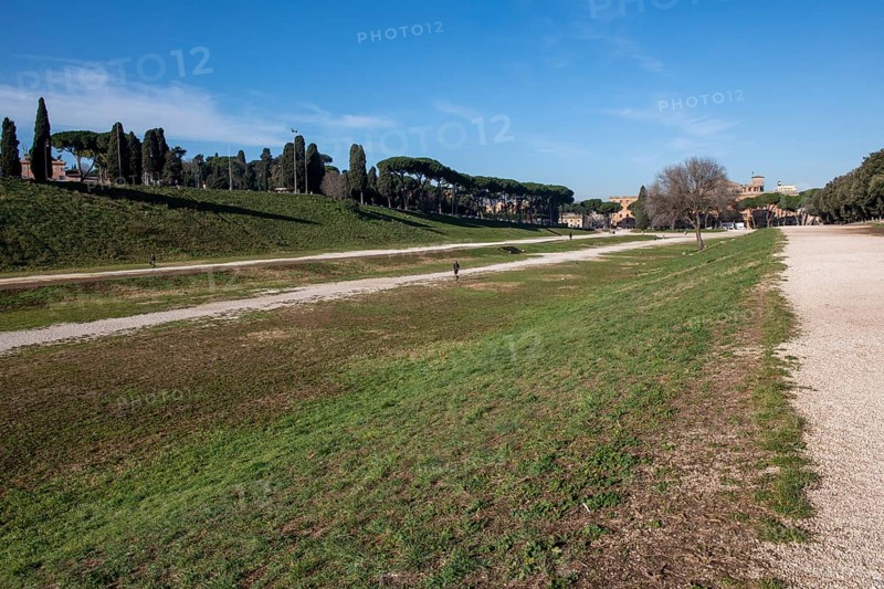 View along today green embankment former spina central element of in Circus Maximus venue of chariot races towards ancient southeast bend and former start area, Rome, Lazio, Italy