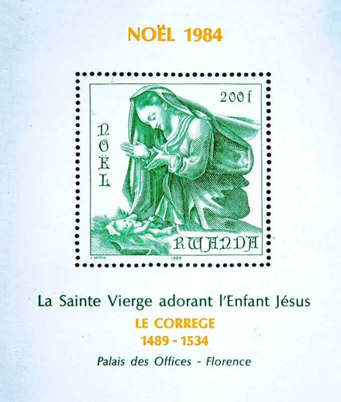Madonna and Child, Mary with Jesus, painting by Le Correge in Florence on Rwandan Christmas stamp 1984