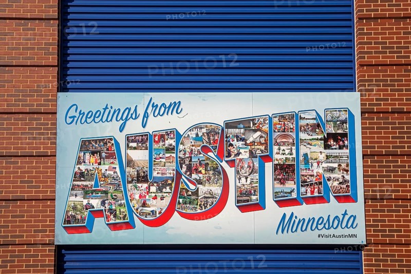 Austin, Minnesota - A 'Greetings from Austin' sign onthe side of the SPAM Museum. SPAM is a lunch meat made of pork and ham, canned by Hormel Foods. Hormel is headquartered in Austin