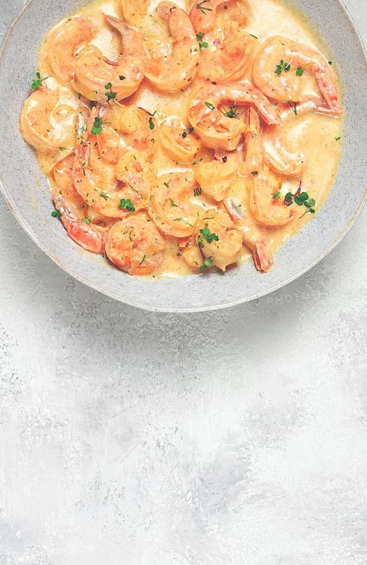 Shrimp in creamy garlic sauce, with spices and herbs