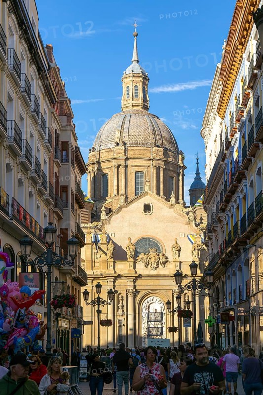 View of Basilica of Our Lady of the Pillar cathedral church from Calle de Alfonso I, Zaragoza, Aragon, Spain