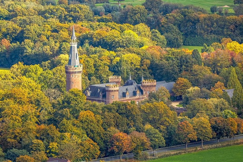 Aerial view, Moyland Castle Museum, neo-Gothic moated castle and castle park surrounded by meadows and fields and autumn forest, tourist destination on the Lower Rhine, Moyland, Bedburg-Hau, Lower Rhine, North Rhine-Westphalia, Germany