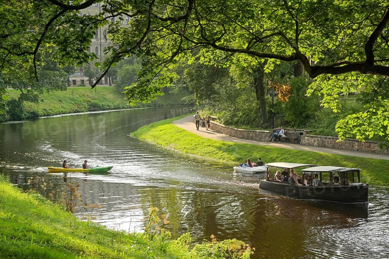 People, leisure, tour boat, pedal boat, kayak, city canal, municipal park, Riga, Latvia
