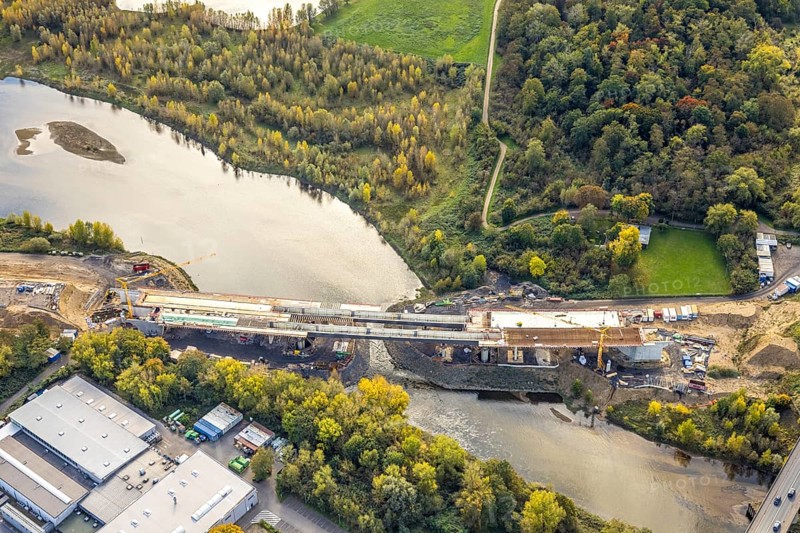 Aerial view, Lippe bridge construction site, new bridge over the river Lippe to connect to the federal road B58 and Lower Rhine bridge Wesel, Wesel, Lower Rhine, North Rhine-Westphalia, Germany, construction area, building plot, construction project, construction project, construction site, trees in autumn colors, DE, Europe, autumn, autumn colors, autumn mood, autumn forest colors, aerial photography, aerial photography, new building, overview, bird's eye view, birds-eyes view, autumn trees, overview
