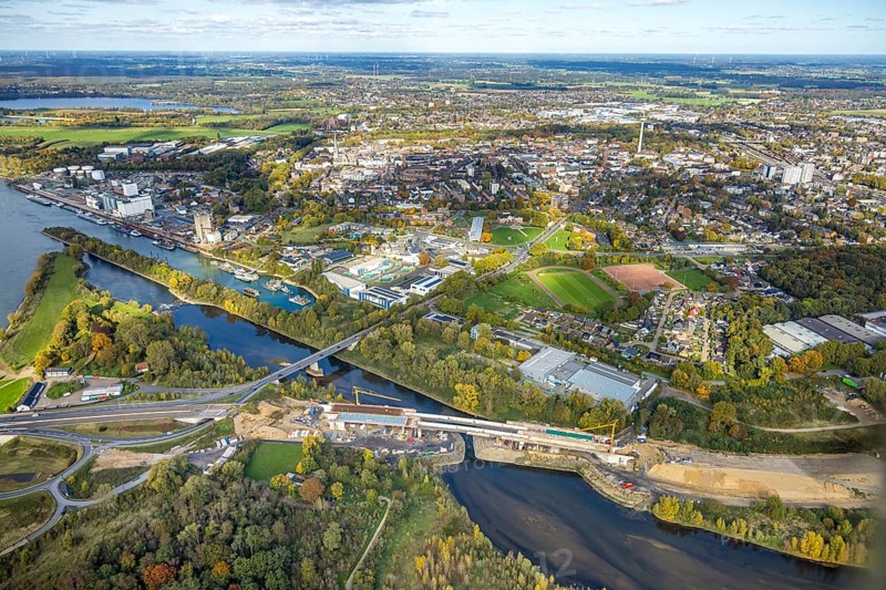 Aerial view, Lippe bridge construction site, new bridge over the river Lippe for connection to the federal road B58 and to the Lower Rhine bridge in Wesel, Lower Rhine, North Rhine-Westphalia, Germany, construction work, building area, building plots, construction project, construction site, DE, Europe, aerial photo, aerial photography, aerial photography, new building, overview, bird's eye view, Wesel, birds-eyes view, overview