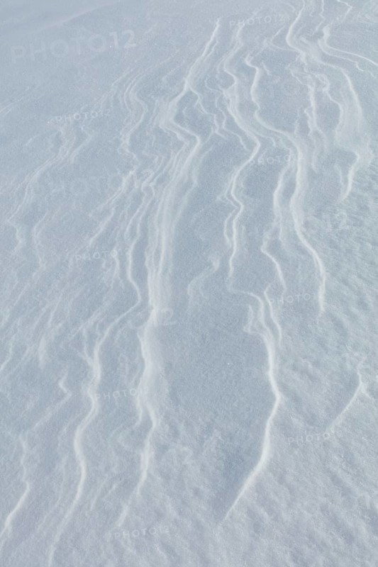 Wind has made patterns on snow surface, Toronsuo National Park, Tammela, Finland