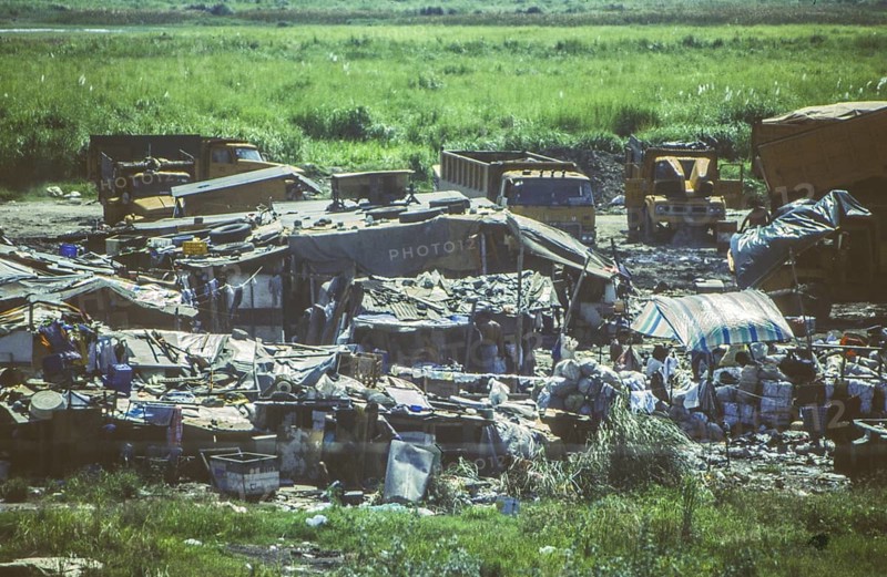 Slum, slum in a swamp area next to a main road, Manila in 1995, Philippines
