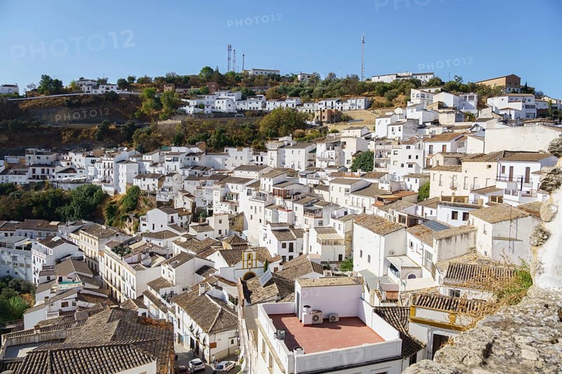 Setenil de las bodegas, cadiz, spain Looking down at setenil de las bodegas, a white village in rural andalusia, with traditional houses built into the rock