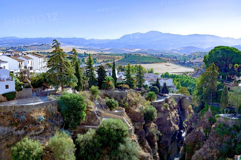 Ronda, malaga, spain, a beautiful white village, presenting its unique architecture on the edge of el tajo gorge