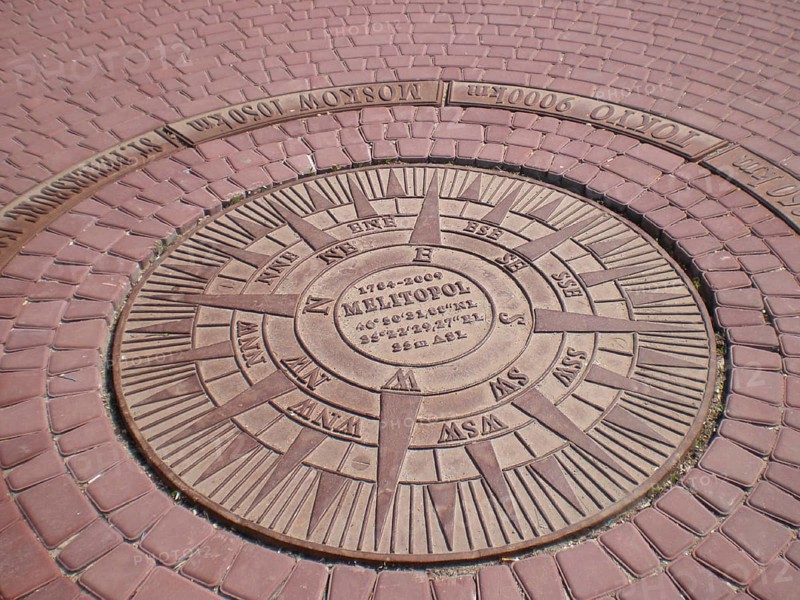 The geographic azimuth at Victory Square is located in the city. Directions to different points of the world emanate from it, along with longitude and latitude coordinates, as well as distances to major cities such as Moscow, St. Petersburg, and Tokyo. The center of the circle indicates the founding date of Melitopol, as of 2009, it was 225 years since its founding. It is a well-known landmark for both tourists and travelers. Melitopol, Ukraine