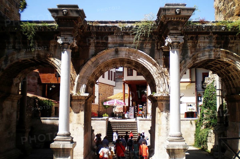 Hadrian's Gate is a triumphal arch located in the ancient Kaleiçi quarter of the resort city of Antalya, on the Mediterranean coast. Built during the Roman Empire to commemorate the arrival of Emperor Hadrian, the gate is a popular landmark for tourists and travelers who come to see the unique ancient Roman architecture of antiquity. Antalya, Turkey