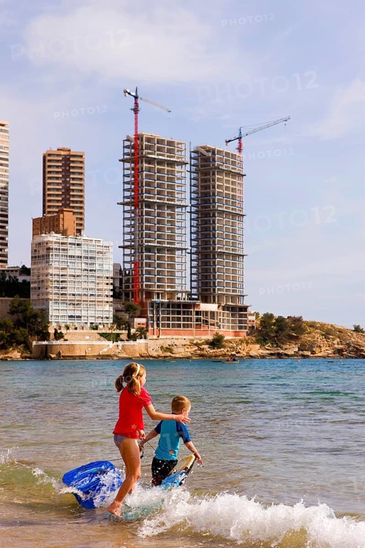 Swimming fun, beach, skyscraper skyline, construction sites, Mediterranean Sea, Benidorm, Valencia (region), Costa Blanca, Spain