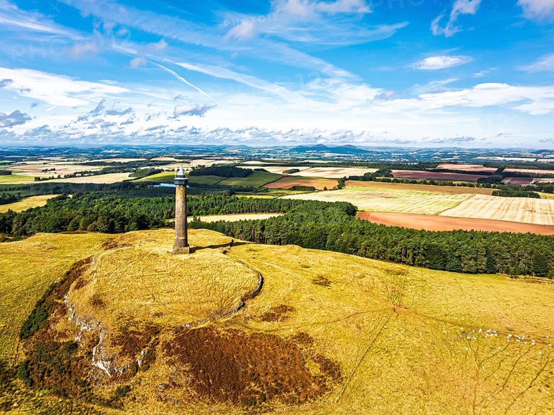 Waterloo Monument over Scottish fields and farms from a drone, Jedburgh, Scotland, UK