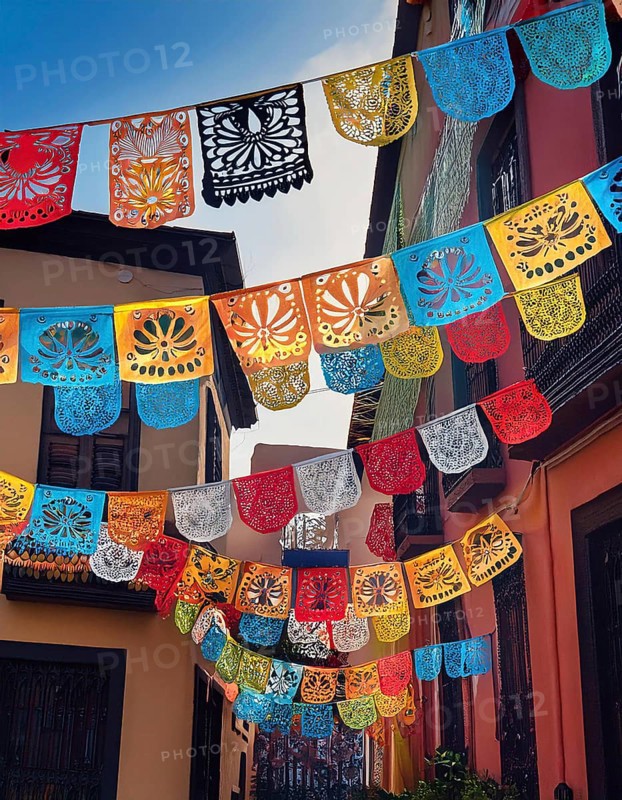 A vibrant display of colorful papel picado decorations hanging across a narrow Mexican street, capturing the festive spirit of Día de Muertos with traditional Mexican decor, AI generated