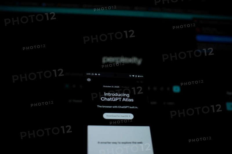 ChatGPT Atlas shown on a smartphone with a dark, perplexity-themed background