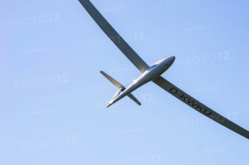 A Schempp-Hirth Arcus E motor glider, registration D-KWKU, during a screening as part of an air show at the Fliegerbergfest of the Rossfeld Luftsportverein in Metzingen-Glems, Baden-Württemberg, Germany, for editorial use only