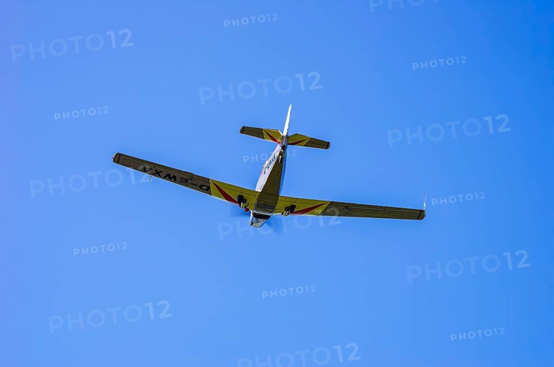 A Moravan Zlin Z-526 aerobatic aircraft, registration D-EWXA, during a demonstration as part of an air show at the Rossfeld Air Sports Association on Rossfeld in Metzingen-Glems, Baden-Württemberg, Germany, for editorial use only