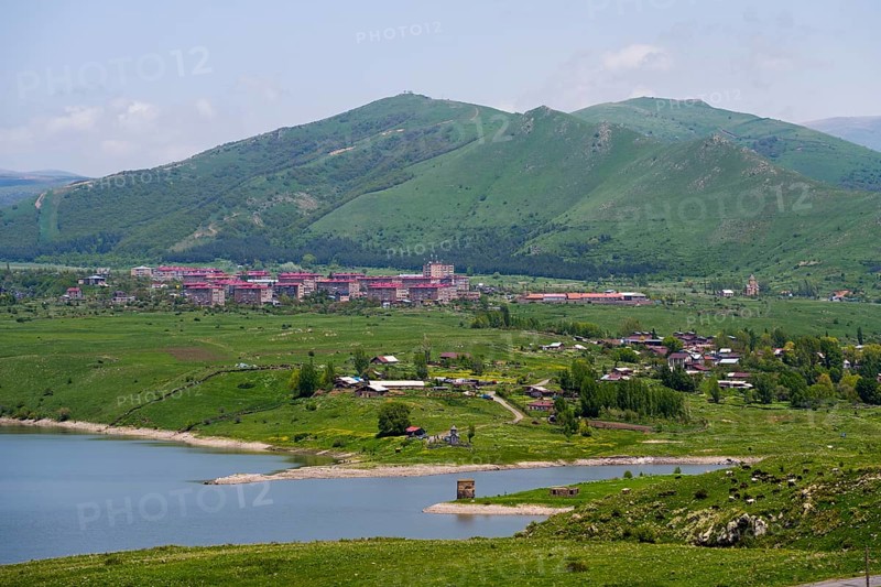 Village in green hills with lake and mountains in the background, Kechut, Kushchi, Kush-Bilyak, and Kechut Reservoir, Wajoz Dzor Province, Vayots Dzor, Armenia