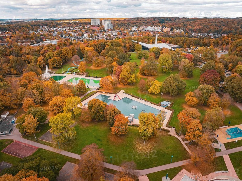 Large municipal park with ponds and colorful autumn trees, ideal for relaxation, Sindelfingen, Böblingen district, Germany
