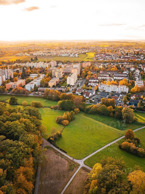 Urban settlement next to forest and green spaces in autumn, Sindelfingen, Böblingen district, Germany