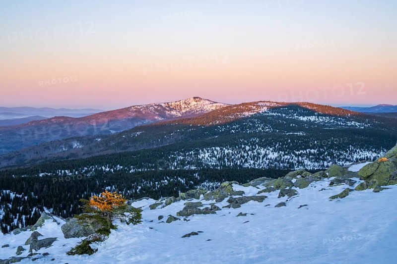 View from Mount Lusen over the hills of the bavarian forest at sunrise, Bavaria, Germany