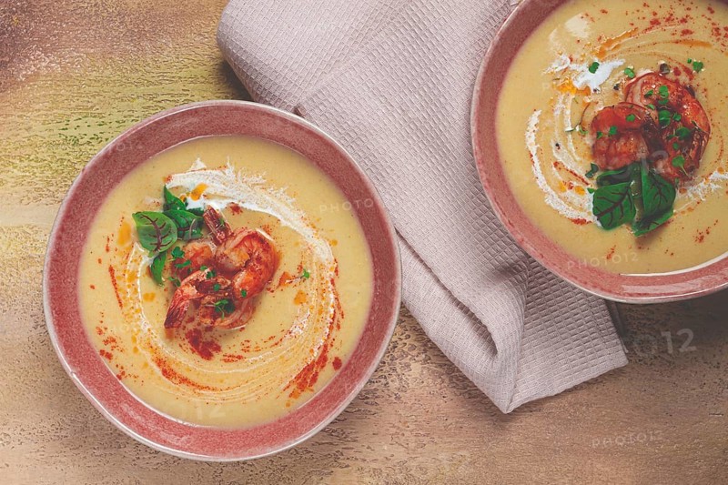Pumpkin cream soup with shrimp, herbs and spices, homemade, no people