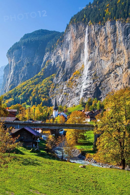 View of town and valley with Staubbach waterfall in autumn, Lauterbrunnen, Bernese Oberland, Canton of Bern, Switzerland