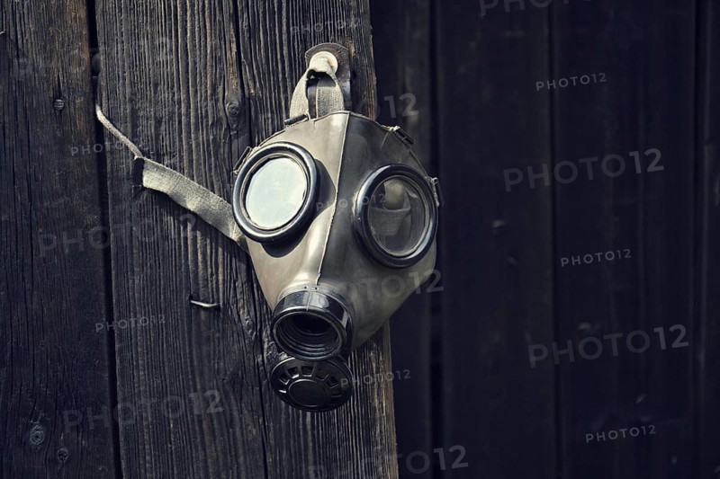 Closeup of a gas mask on a wooden background Prague Czech republic