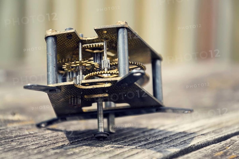 Retro vintage clockwork movement watch mechanism on wood Prague, Czech republic