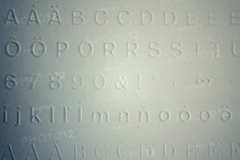 Embossed writing for blind people used before Braille writing system Prague, Czech republic