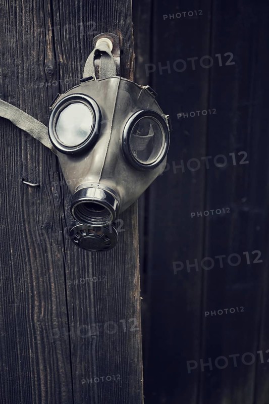 Closeup of a gas mask on a wooden background