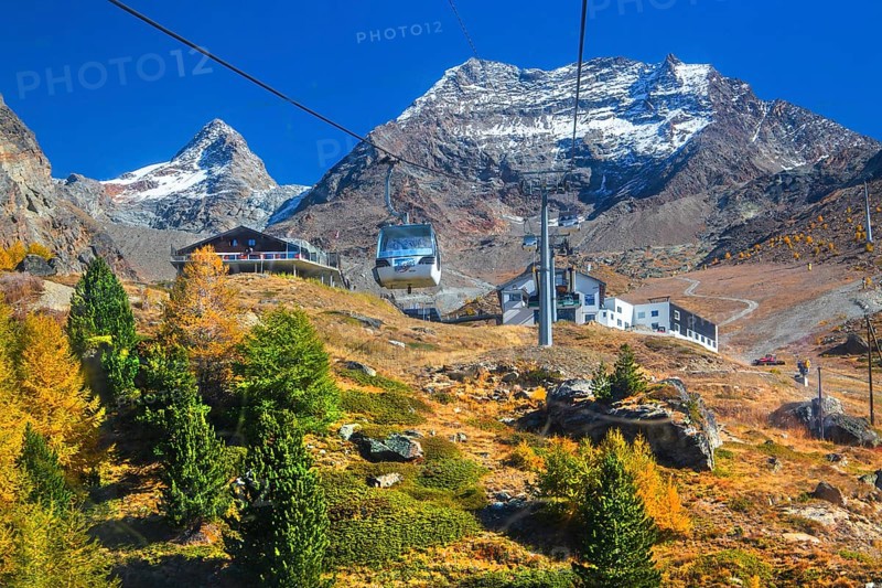 Hohsaas cable car in front of Kreuzboden mountain station with Fletschhorn 3986m in autumn, Saas-Grund, Saasertal, Valais, Switzerland