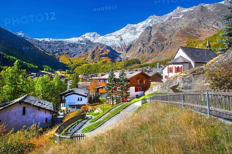 City overview with Allalin 4027 m, Alphubel 420 6 m and Mischabel group 4545 m in autumn, Saas-Fee, Saasertal, Valais, Switzerland