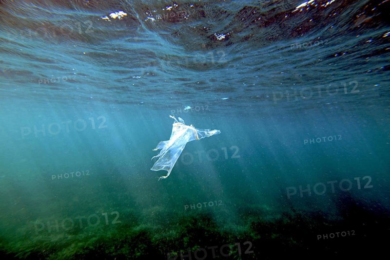 A piece of plastic is floating under the surface of the Mediterranean, Majorca, balearics, spain