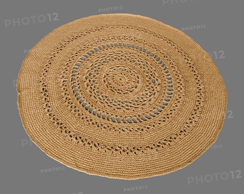 Round crocheted rug on a gray background