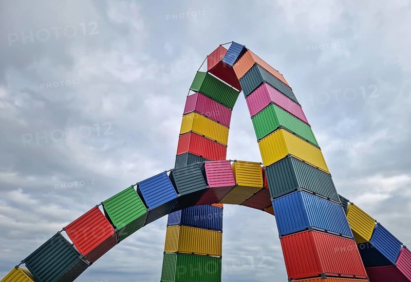 Le Havre, Normandy, France, 29 May, 2025: Striking street art installation Catena Containers Vincent Ganivet in Le Havre. Tall, curved arch made from stacked multicolor shipping containers, Le Havre, Normandy, France