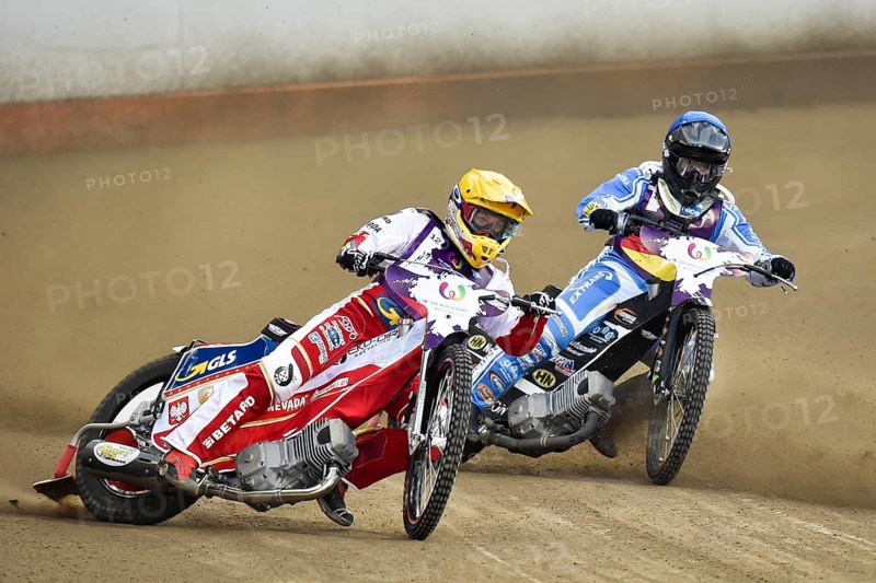 WROCLAW, POLAND - JULY 29, 2017: Speedway couple turnament race Germany - Poland during The World Games. In action Maciej Janowski (Y) and Erik Riss (B)