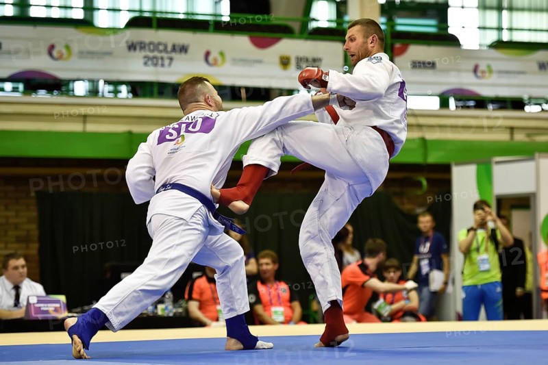 WROCLAW, POLAND - JULY 29, 2017: Ju-Jitsu Fighting tournament during the The World Games 2017. Semifinal fight between Tomasz Szewczak POL (red) - Benjamin Lah SLO (blue)