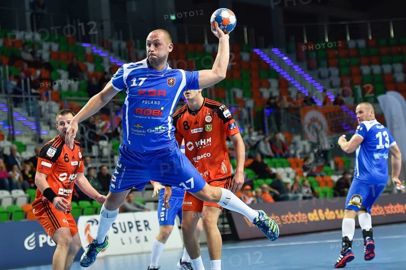 LUBIN, POLAND - OCTOBER 27, 2016: Polish PGNiG Superleague men in handball match between MKS Zaglebie Lubin - MMTS Kwidzyn 24:25. In action Mateusz Seroka